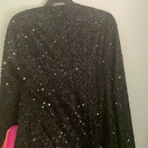 Black button up sequence dress from Fashion Nova